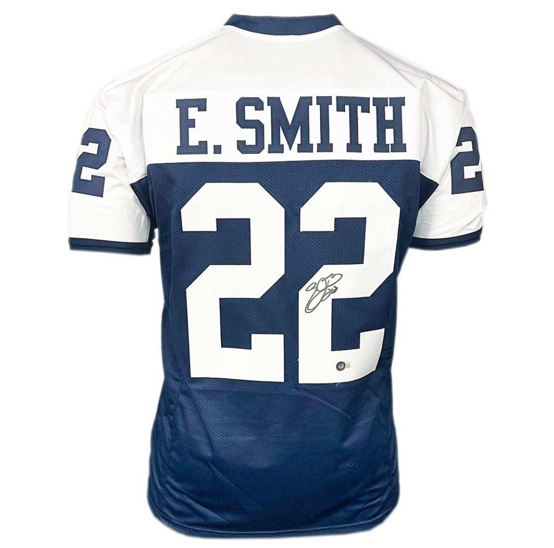 E. Smith signed navy and white sports jersey number 22 back view