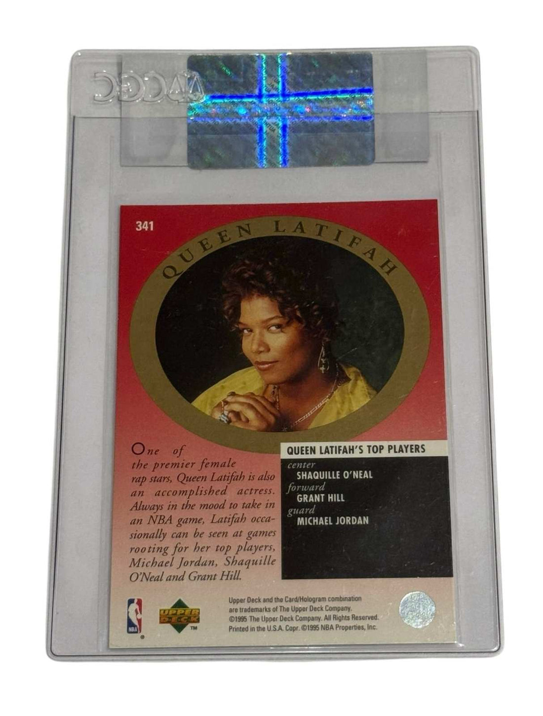 1995-96 UD Michael Jordan Electric Court certified basketball trading card with Queen Latifah insert