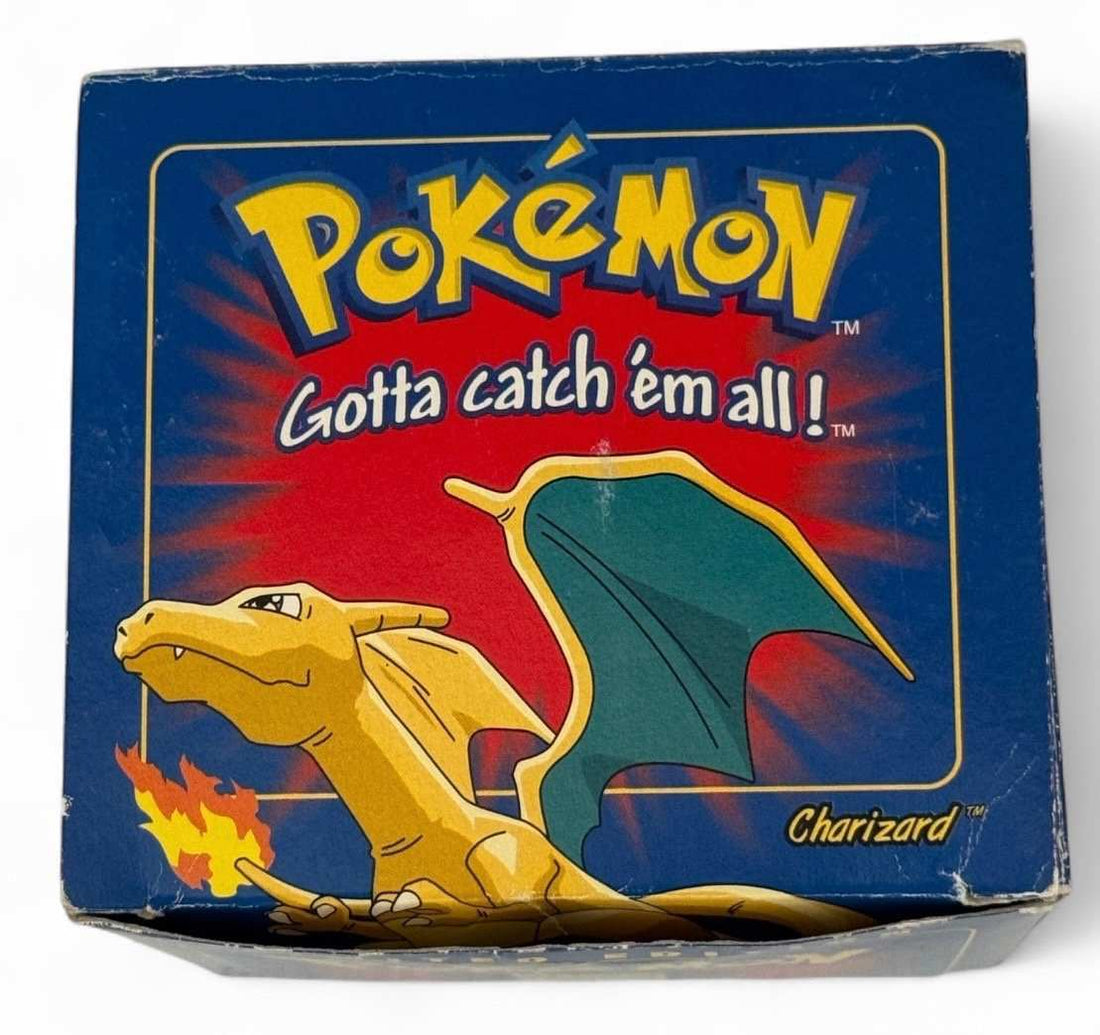 Vintage 1999 Pokémon Charizard 23K gold-plated Burger King promo card sealed in box