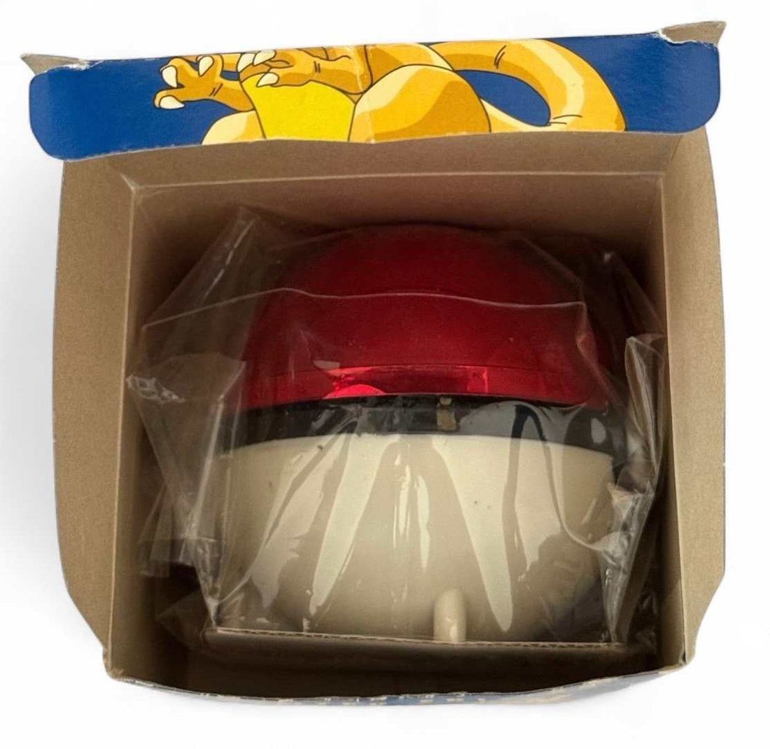 Vintage 1999 Pokémon Charizard 23K gold-plated Burger King promo card sealed in box