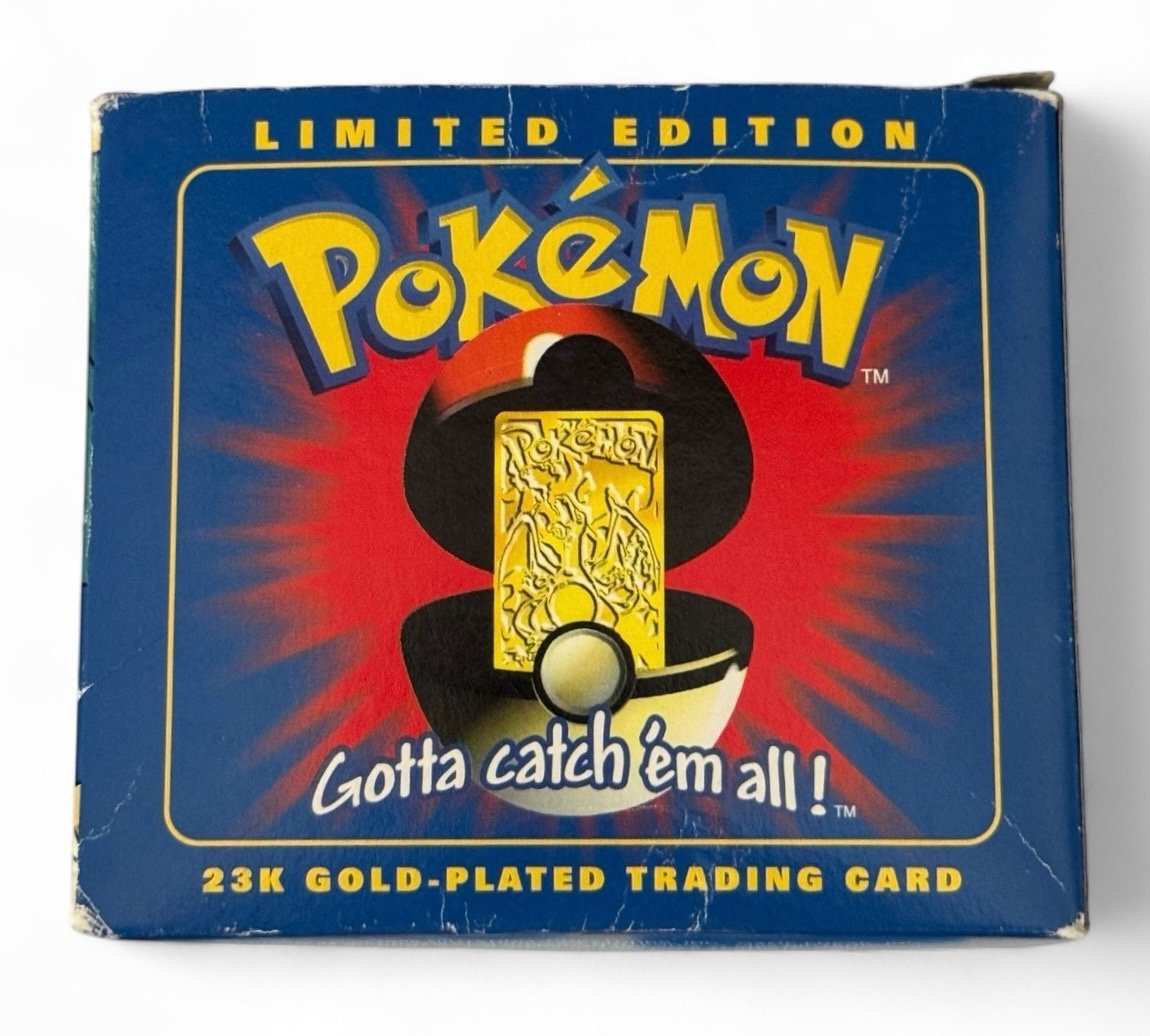 Vintage 1999 Pokémon Charizard 23K gold-plated sealed trading card in limited edition Burger King promo box
