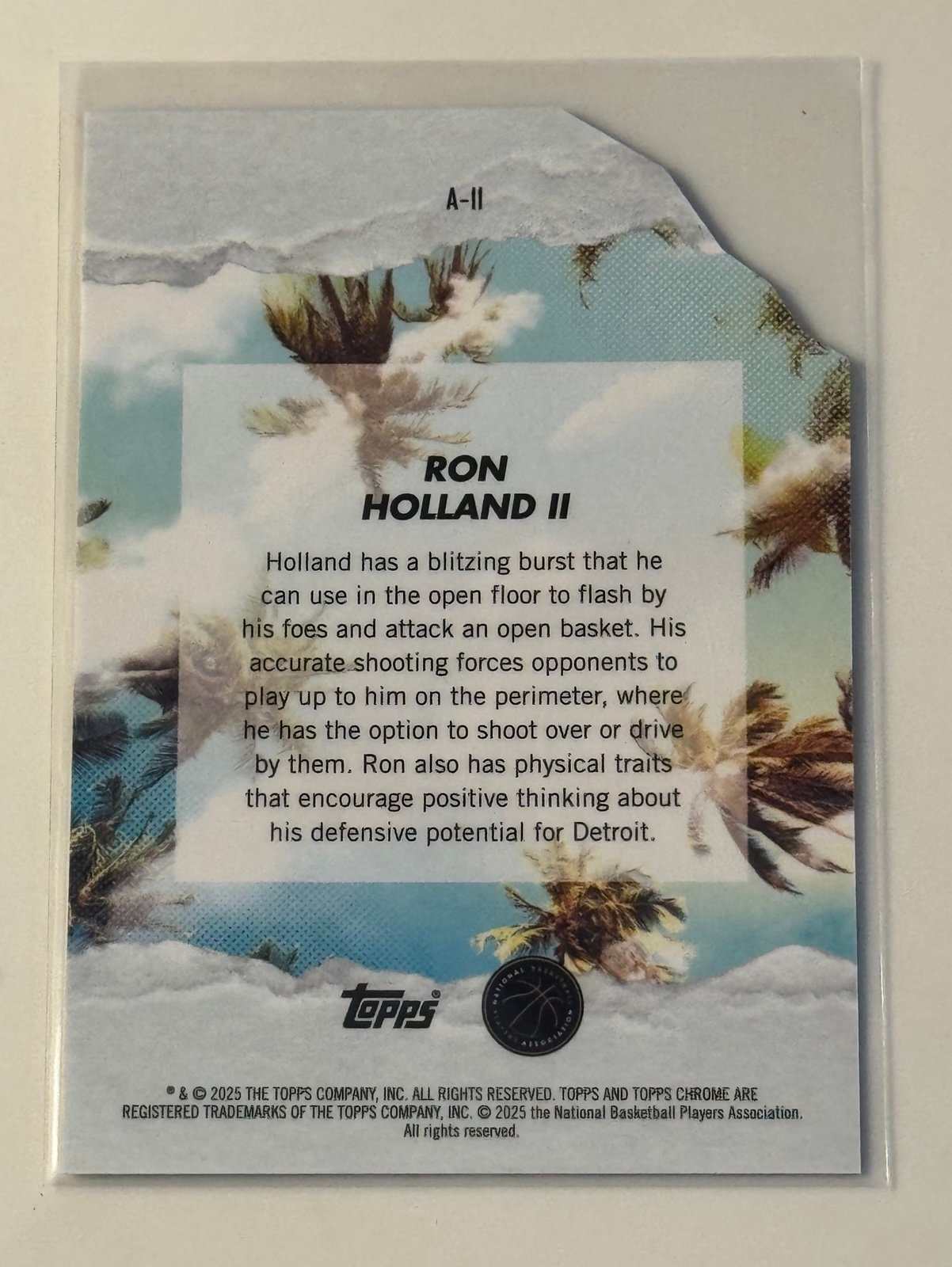 2025 Topps Finest Arrivals Ron Holland II Detroit Pistons rookie card back view in protective sleeve