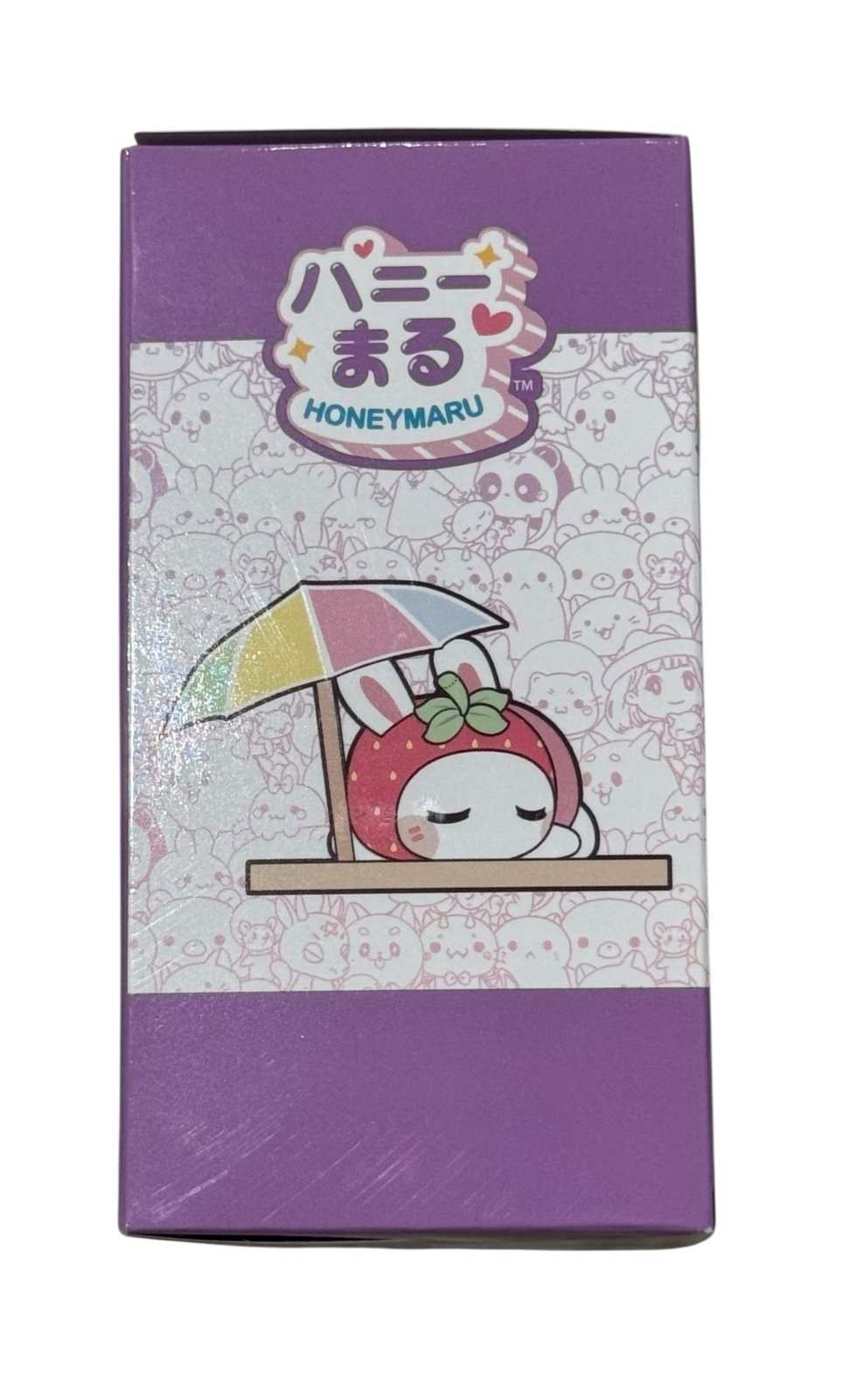 Honeymaru Strawbun Chan strawberry bunny vinyl figure packaging with kawaii sleepy bunny and umbrella illustration
