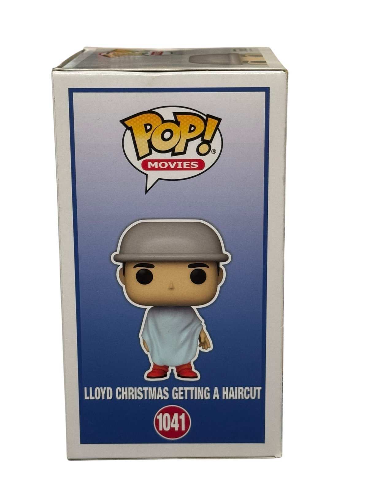 Lloyd Christmas Pop 1041 Funko Pop figure from Dumb and Dumber getting a haircut scene in box
