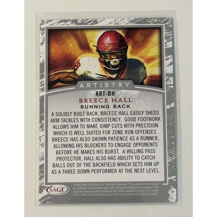 2022 Sage Artistry Breece Hall rookie football card with gold border and action artwork