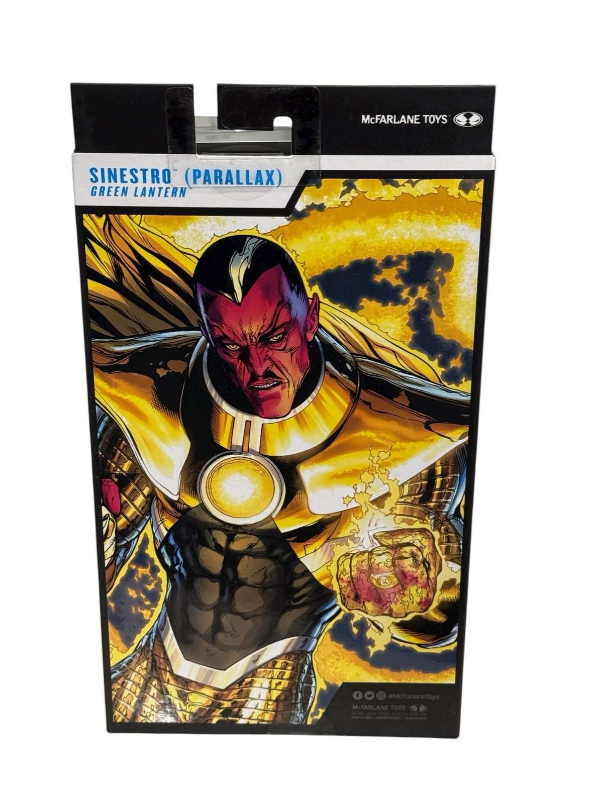 Gold Label McFarlane Sinestro Parallax 7-inch action figure in packaging with yellow energy effects and display base