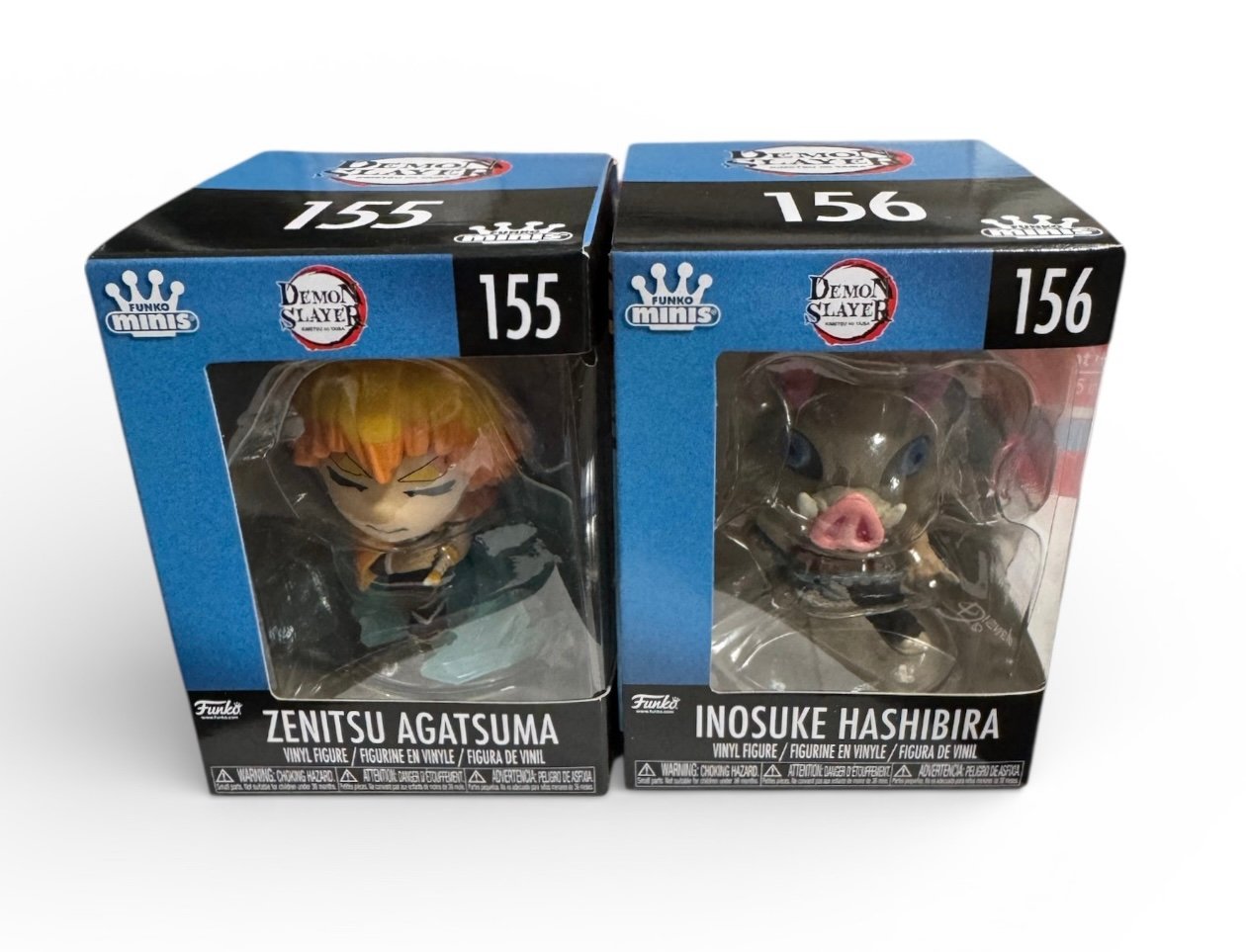 Funko Stunning MINIs Demon Slayer Zenitsu Agatsuma and Inosuke Hashibira figures in boxes
