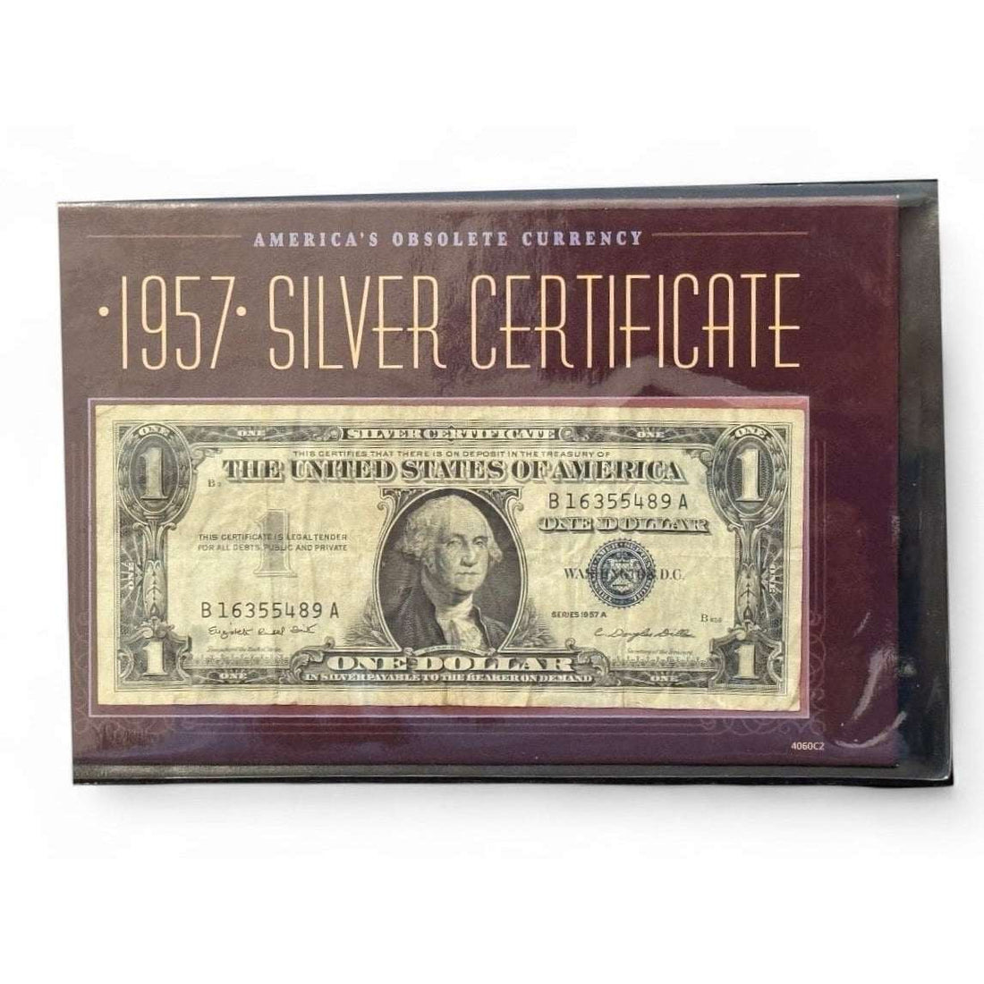 1957 A 1 Silver Certificate Blue Seal US collectible currency note displayed with authenticity certificate in protective case