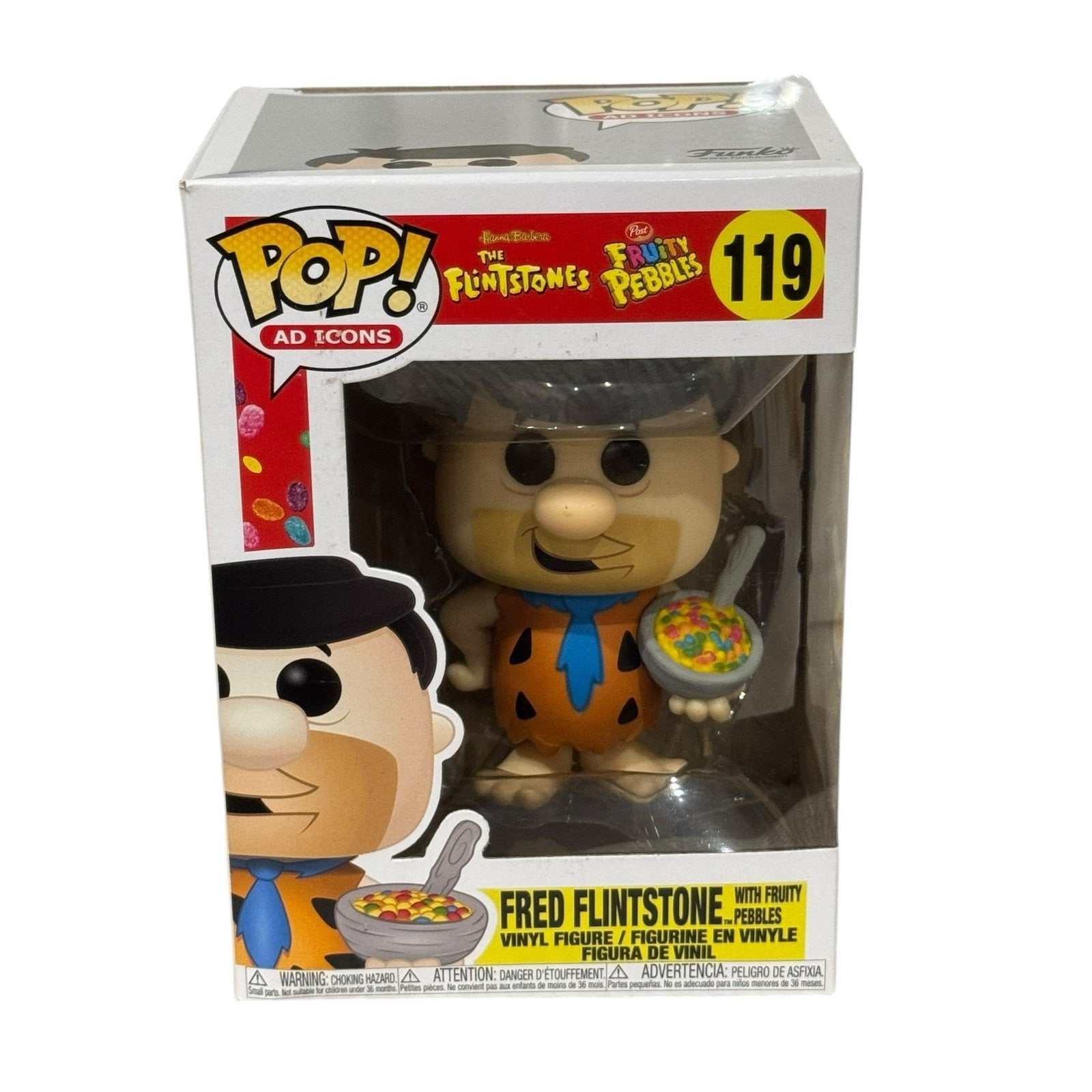 Fred Flintstone Funko Pop figure holding Fruity Pebbles cereal collectible in box