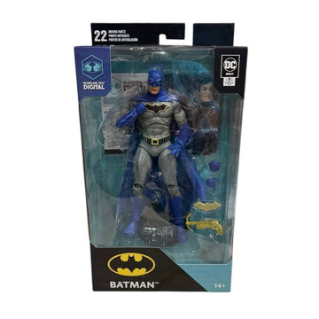 McFarlane DC Rebirth Batman 7-inch action figure in sealed packaging with accessories and digital code